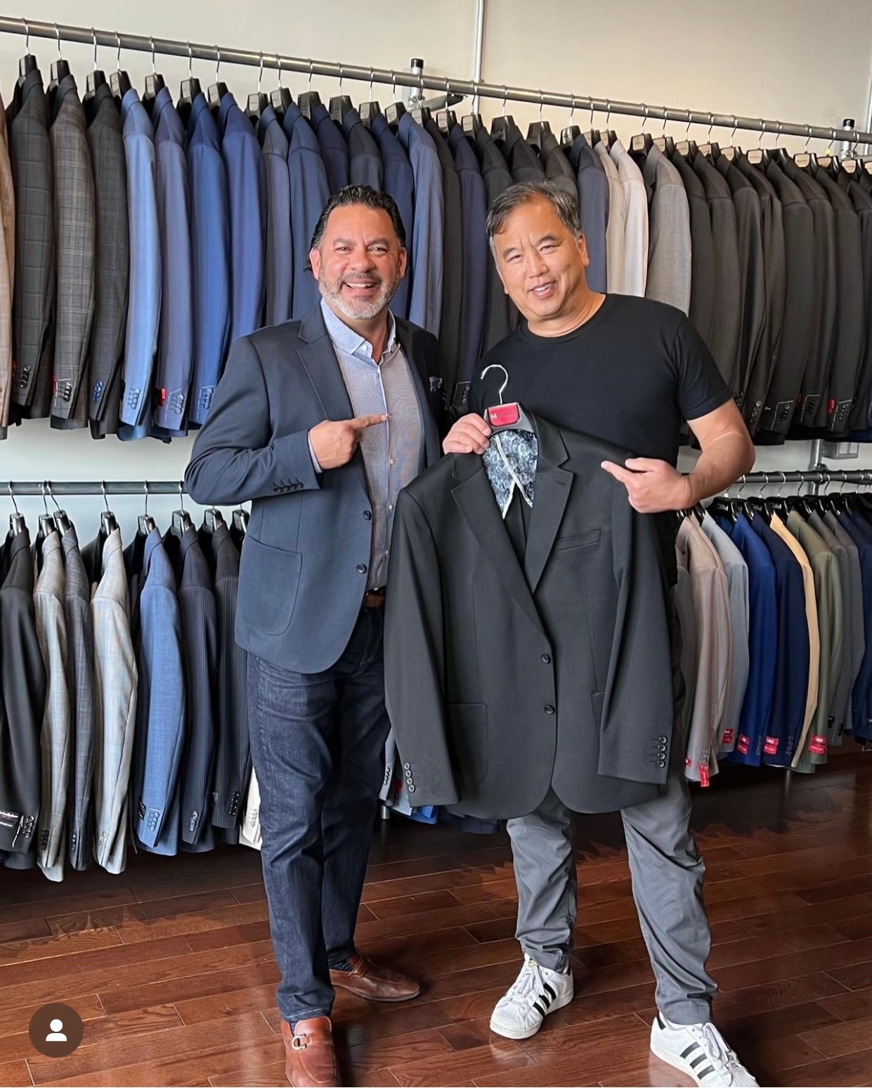 Luis Arandia at an upscale indoor event — dressed impeccably